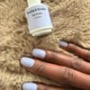 Stella & Emilie Gel Polish on in color Lavender with bottle close.